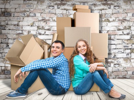 Furniture being carried carefully from a Southgate property during removals