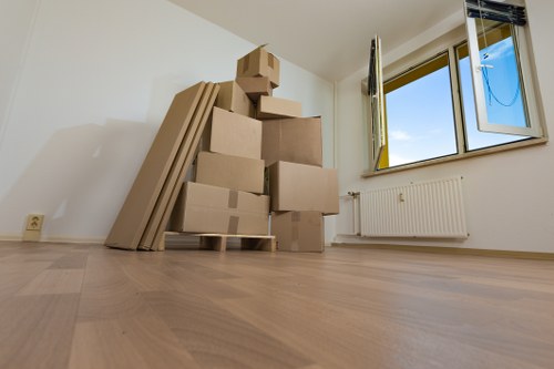 Professional moving van loading items for a North London move