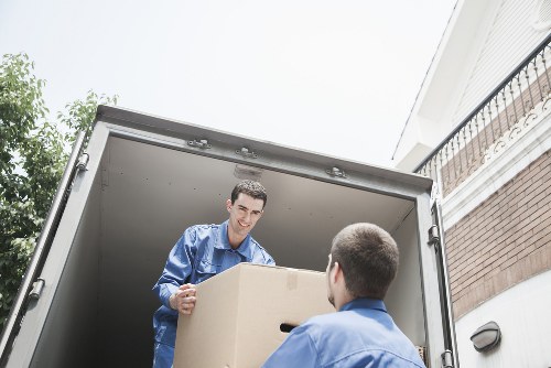 Removal team loading furniture for a Southgate property move