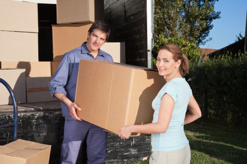 Packed office boxes and furniture ready for relocation